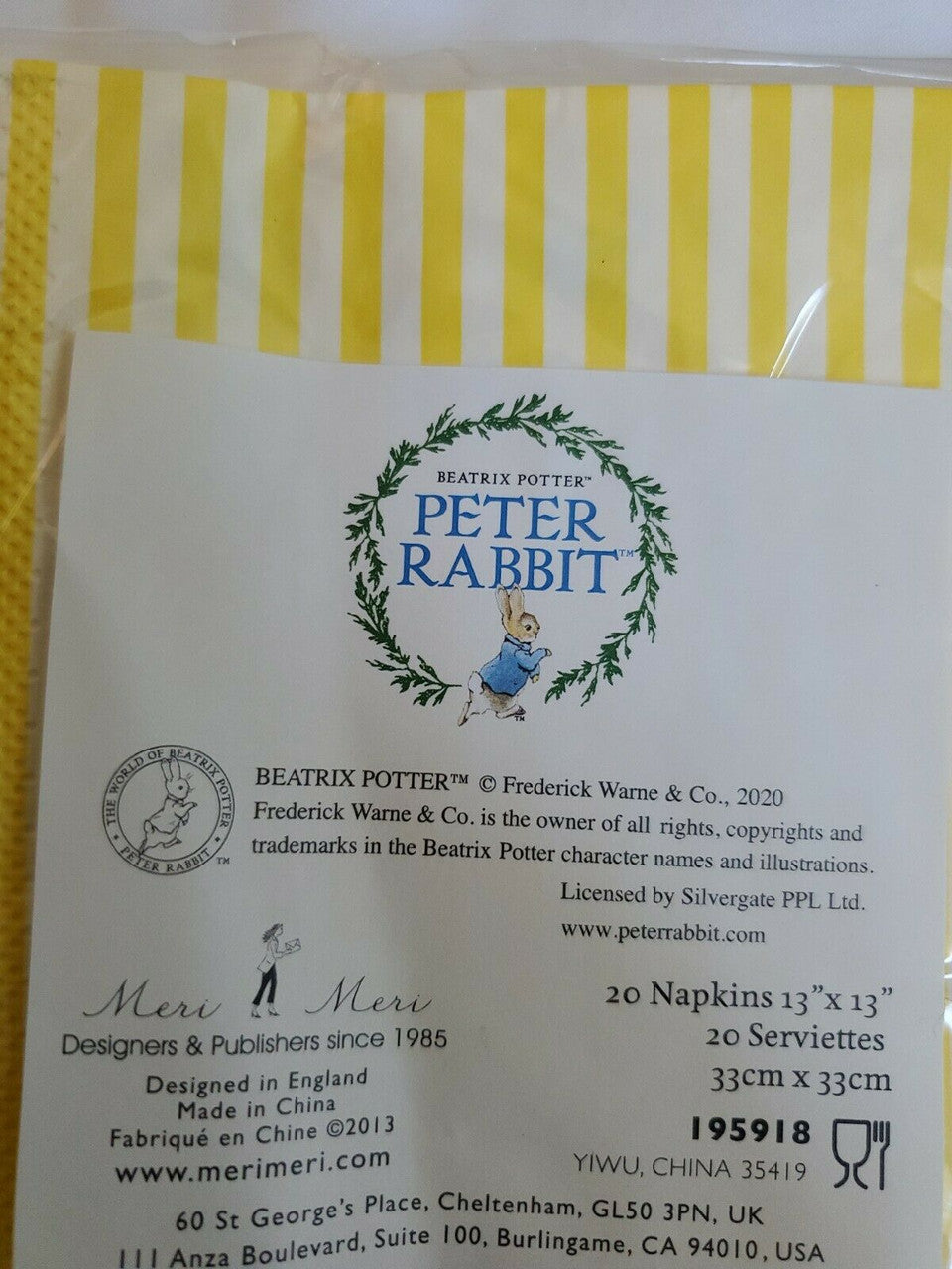 Peter Rabbit Easter paper napkins with yellow scalloped edges and Beatrix Potter illustration, 13 by 13 inches