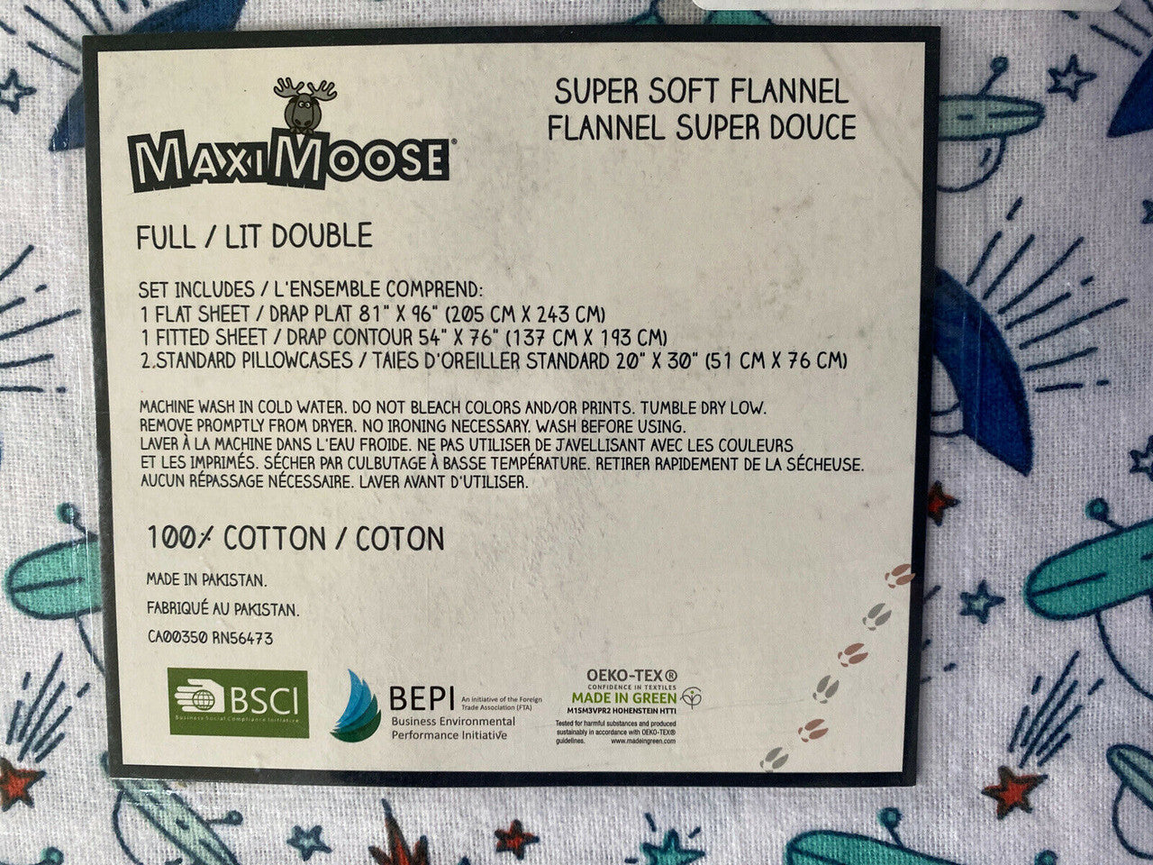 Fabric label for Maxi Moose flannel bedding set with text and logos.