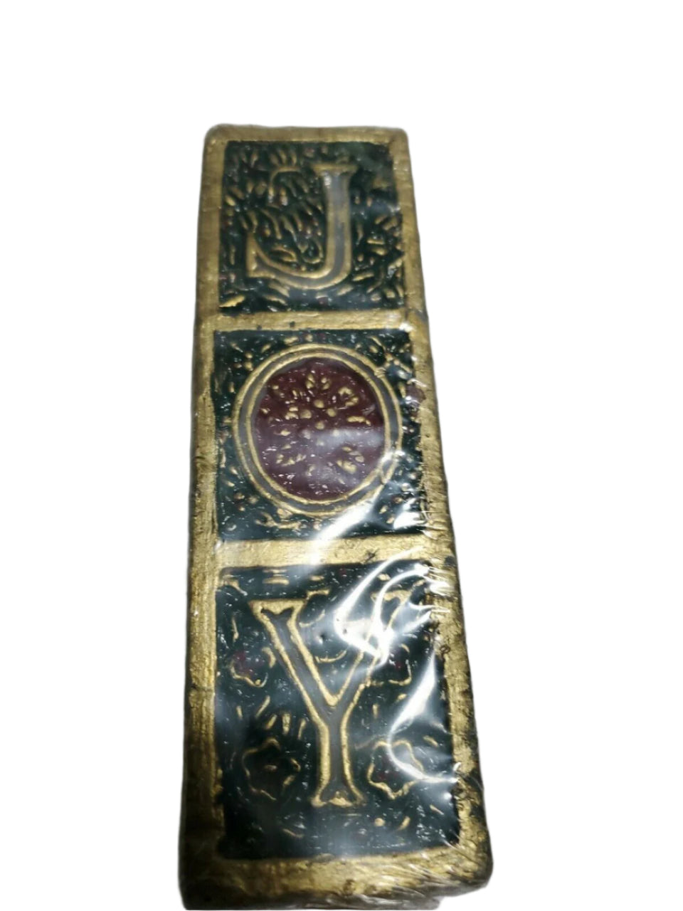Vintage 7-inch Colonial Candle of Cape Cod with JOY lettering in gold and red wreath design, sealed in original wrap.