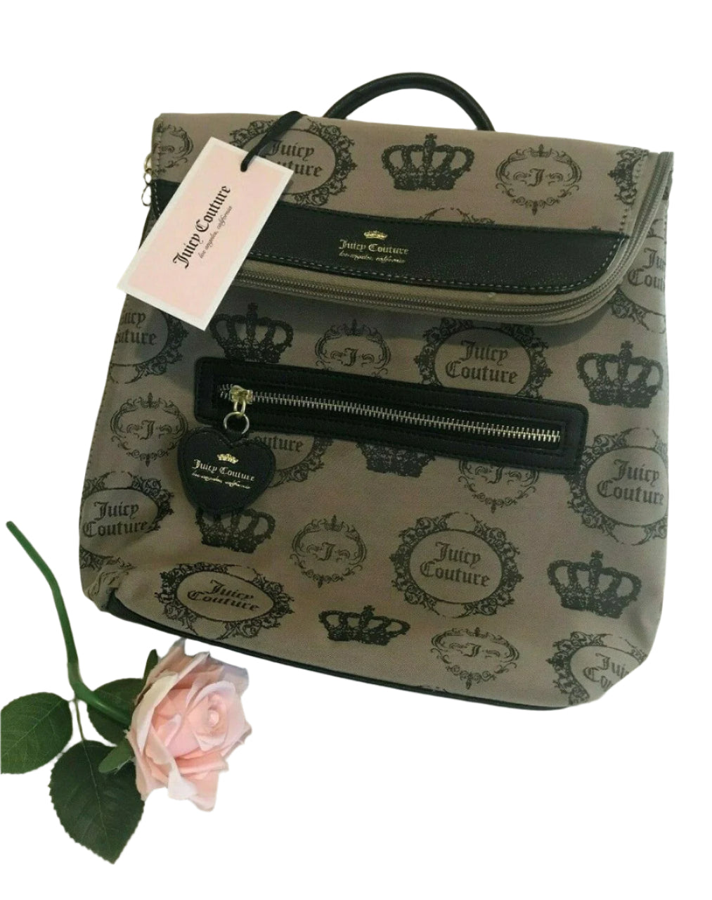 Beige and black canvas backpack with gold Juicy Couture logo and medallion design