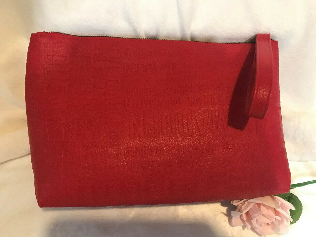 Steve Madden red cosmetic bag with gold zipper logo wristlet