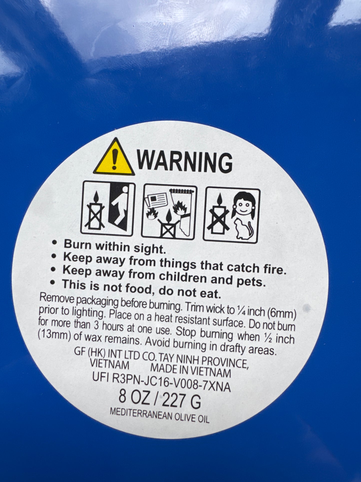 Coastal sardine tin with two colorful fish-shaped Mediterranean olive oil scented candles