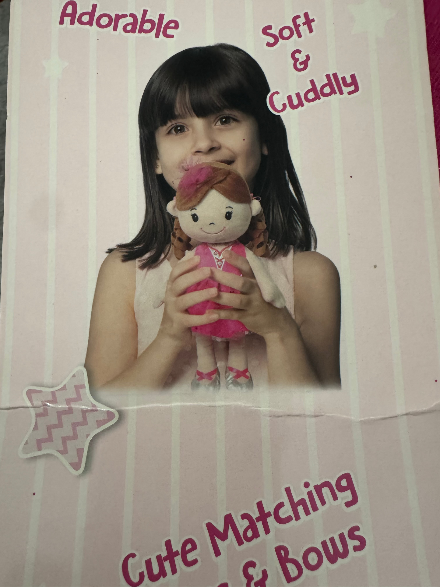 Soft plush girl doll in pink ballerina dress with silver shoes, displayed in standing position