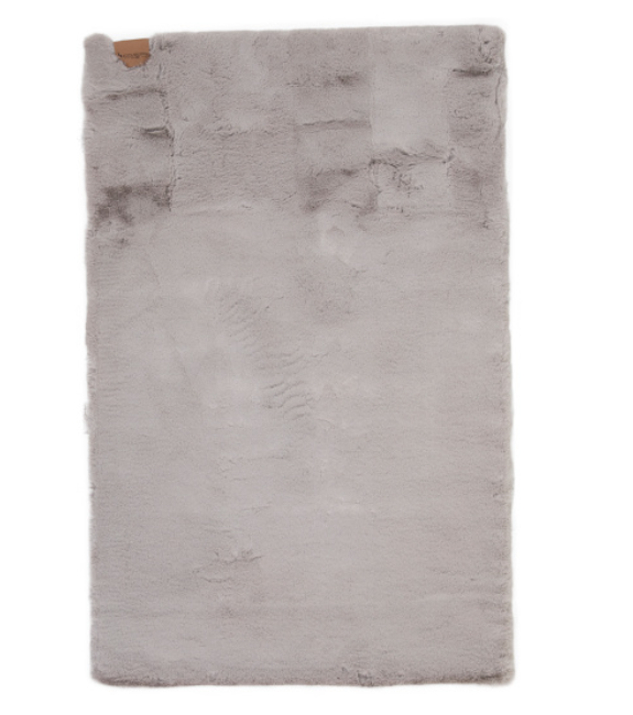 Faux fur Baxter accent rug in light neutral color 27 by 44 inches by Koolaburra by UGG