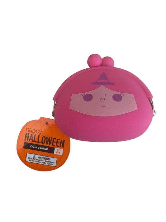 Bright pink silicone coin purse with clasp closure, photographed on a light surface