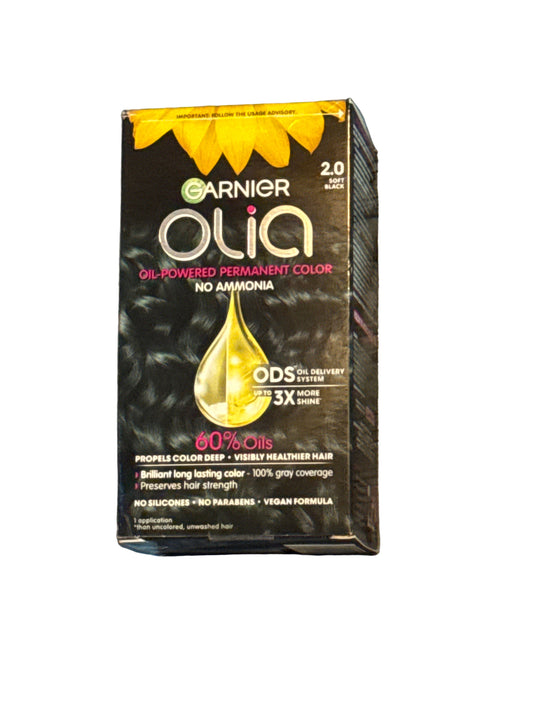 Front of Garnier Olia hair color box showing shade 2.0 Soft Black
Back of hair color box with instructions and ingredient information
Side view of Garnier Olia packaging displaying oil-powered color branding