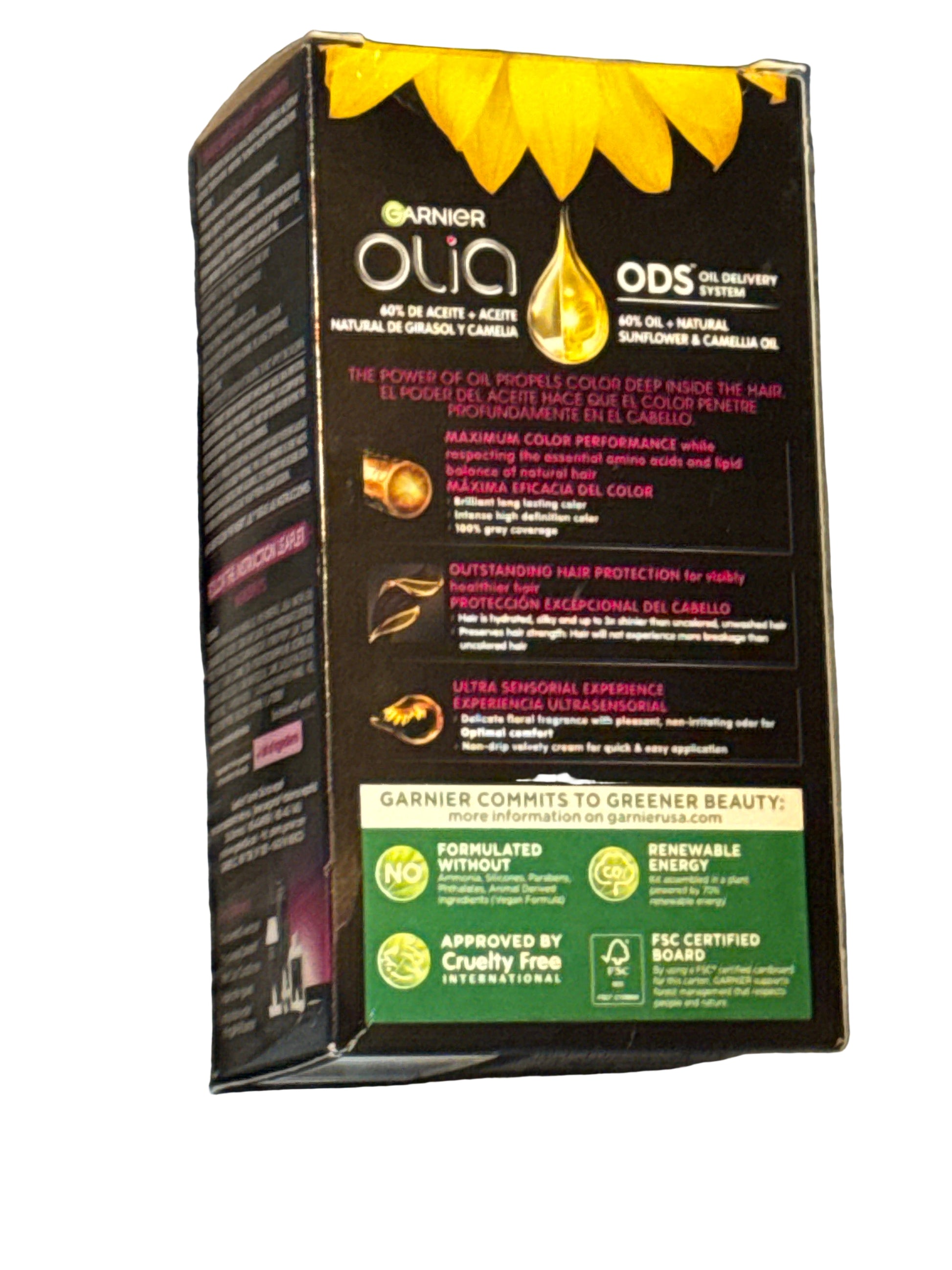 Front of Garnier Nutrisse Ultra Color hair dye box showing shade B4 Golden Mahogany Brown
Back of hair color box with instructions and ingredient information
Side view of Garnier Nutrisse Ultra Color packaging