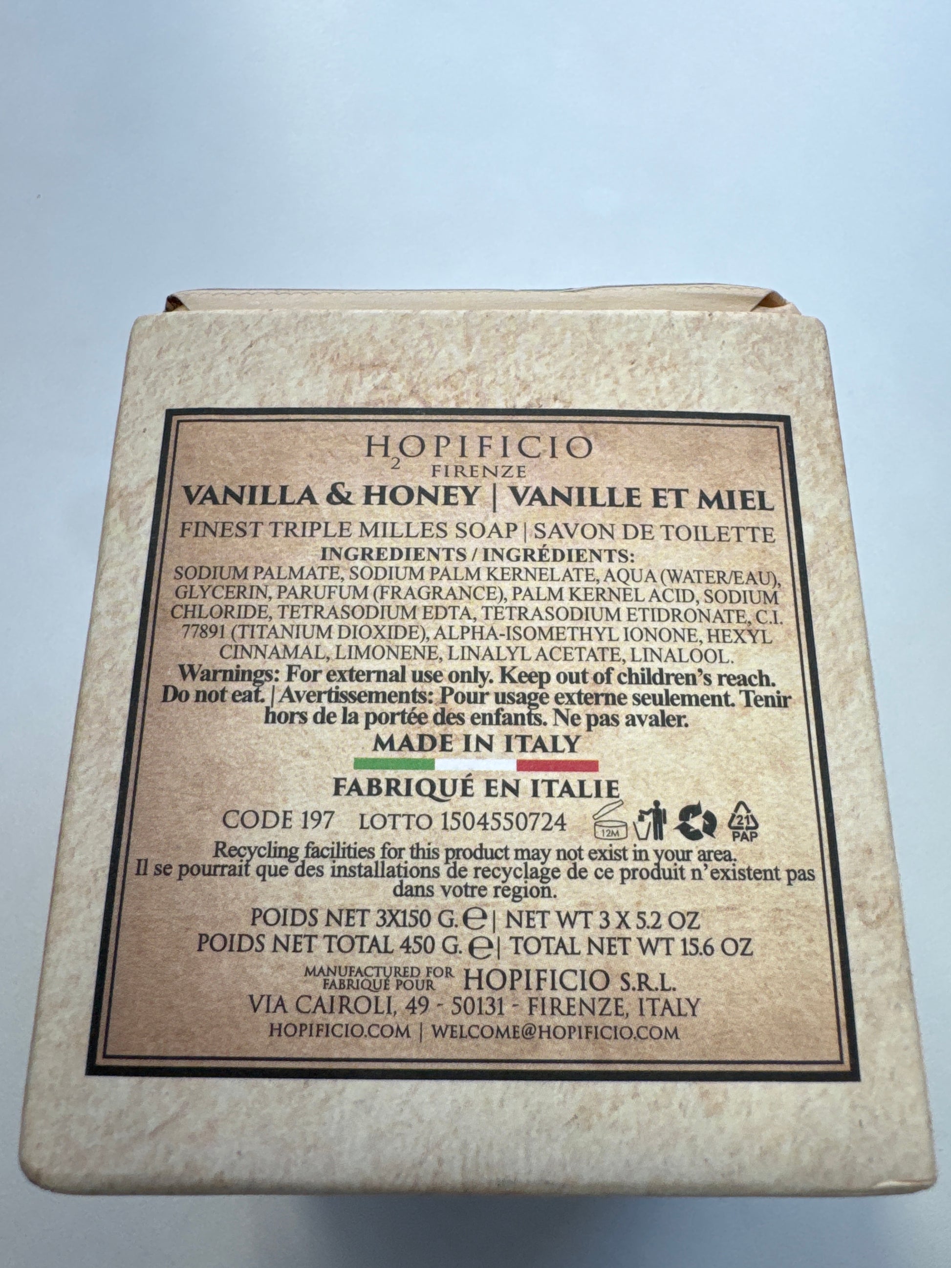 Three-bar soap gift set with vintage-style holiday packaging, tied with red ribbon, scented in vanilla and honey.