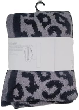 Black and gray fuzzy leopard knit wrap with open poncho-style fit