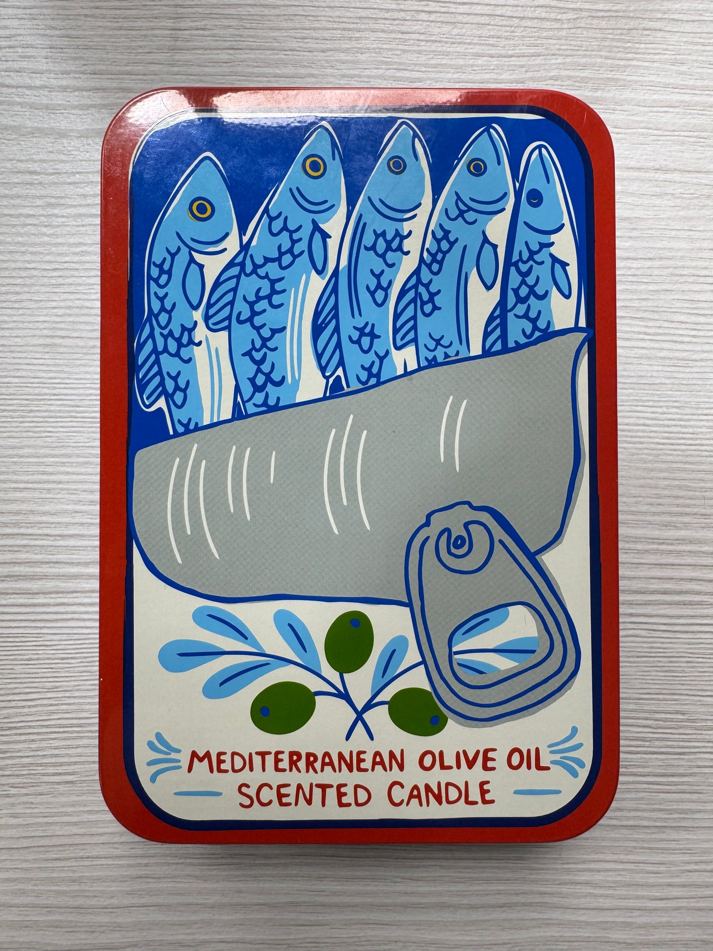 Coastal sardine tin with two colorful fish-shaped Mediterranean olive oil scented candles
