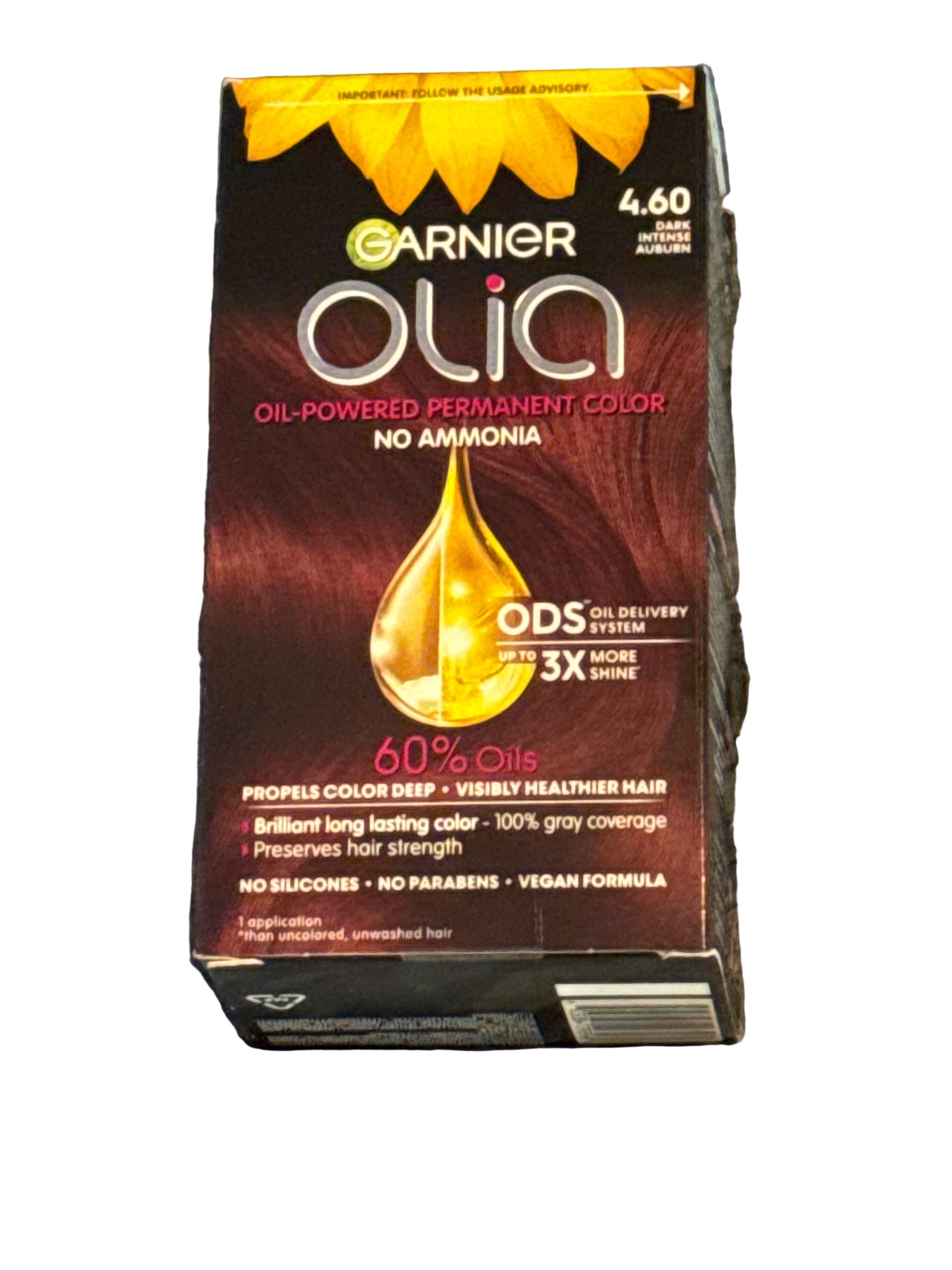 Front of Garnier Olia hair color box showing shade 4.60 Dark Intense Auburn
Back of hair color box displaying instructions and product information
Side panel of hair color packaging with shade details
Hair color box laid flat showing oil-powered color branding