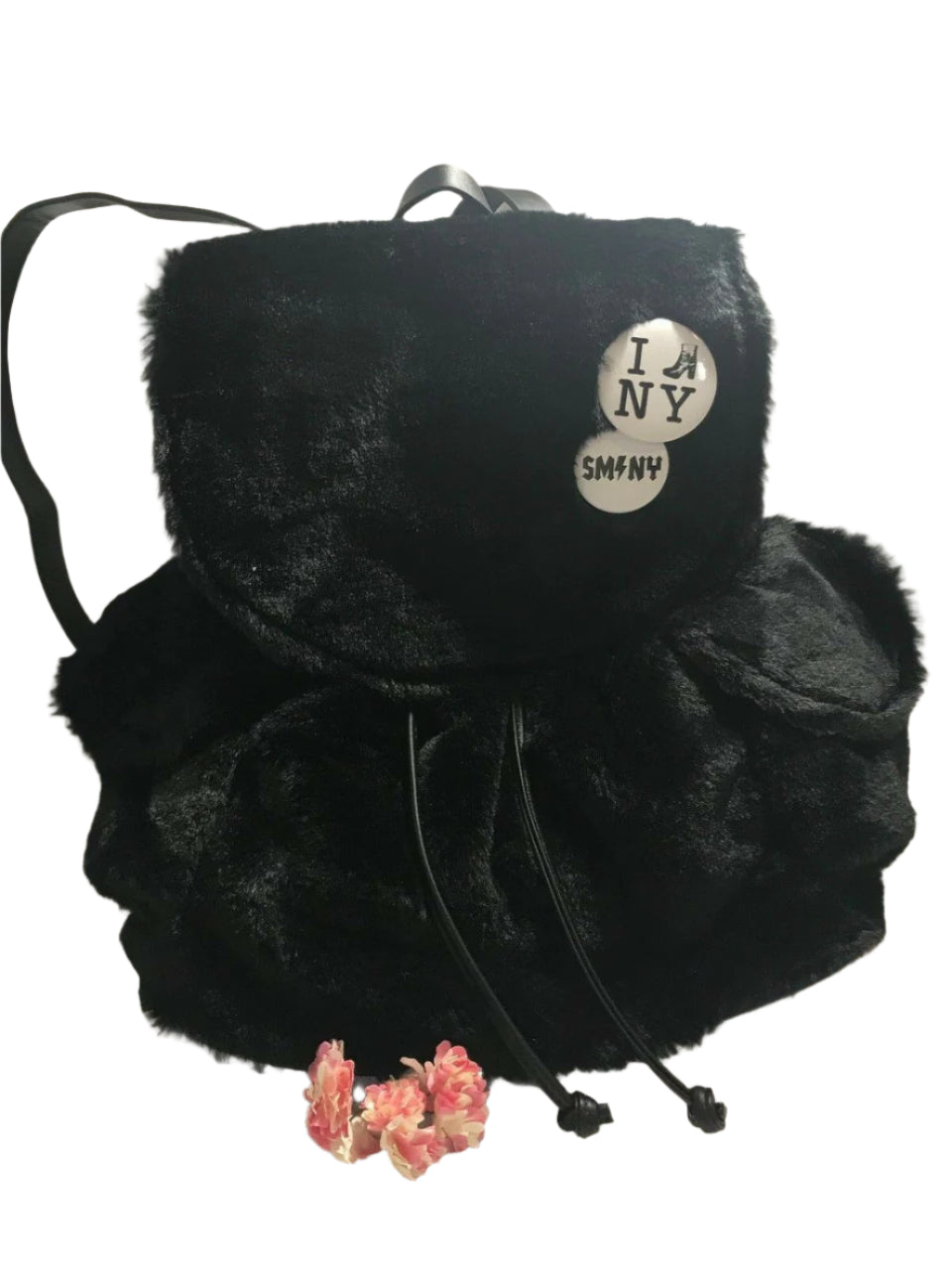 Steve Madden medium black faux fur backpack with decorative pin, side pockets, and drawstring flap