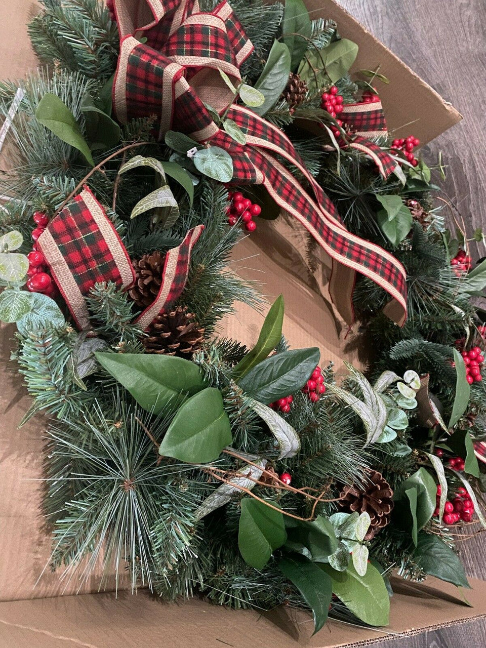 33-inch mixed floral holiday wreath with plaid ribbon and faux berries, new in box.