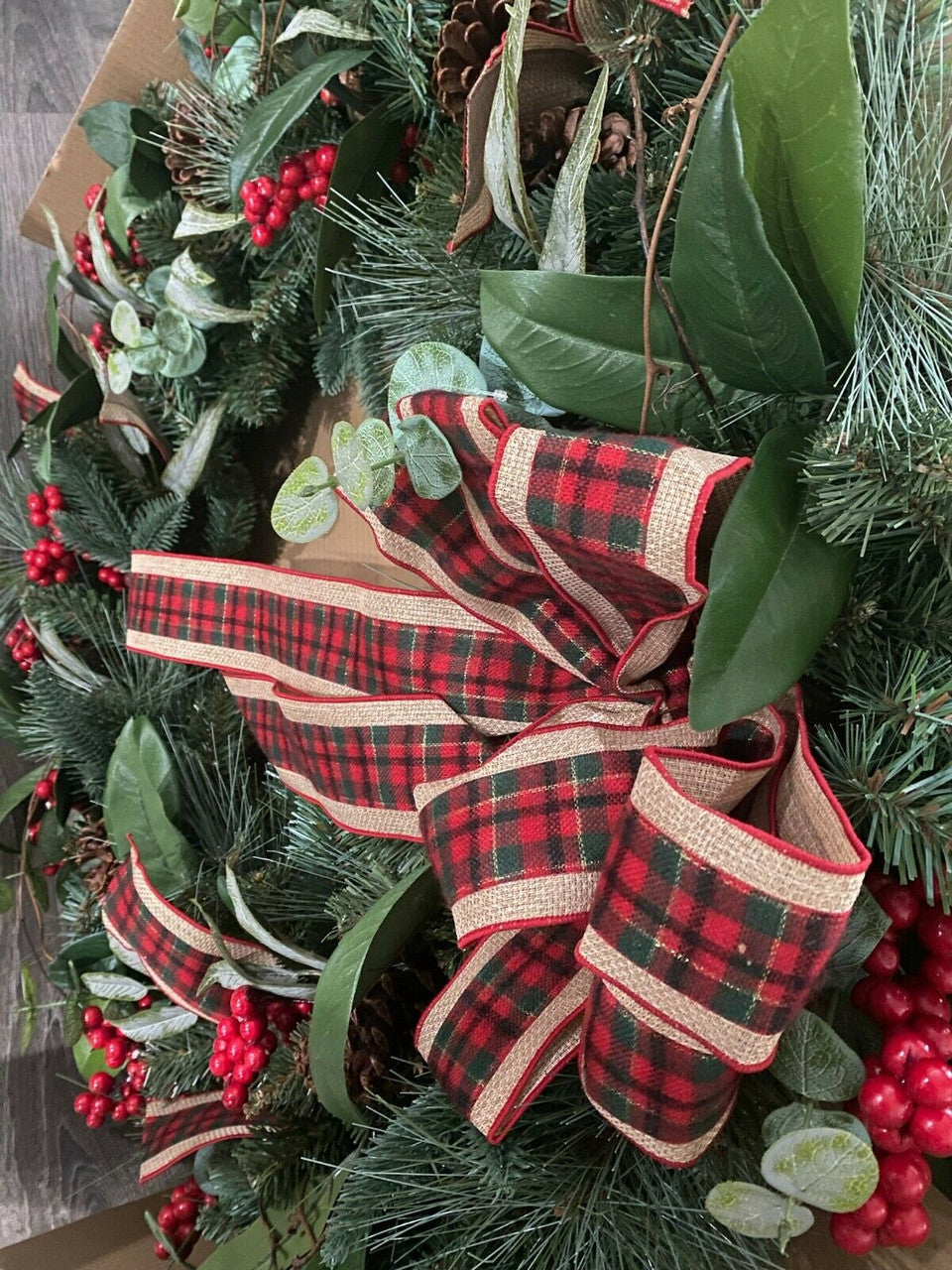 33-inch mixed floral holiday wreath with plaid ribbon and faux berries, new in box.