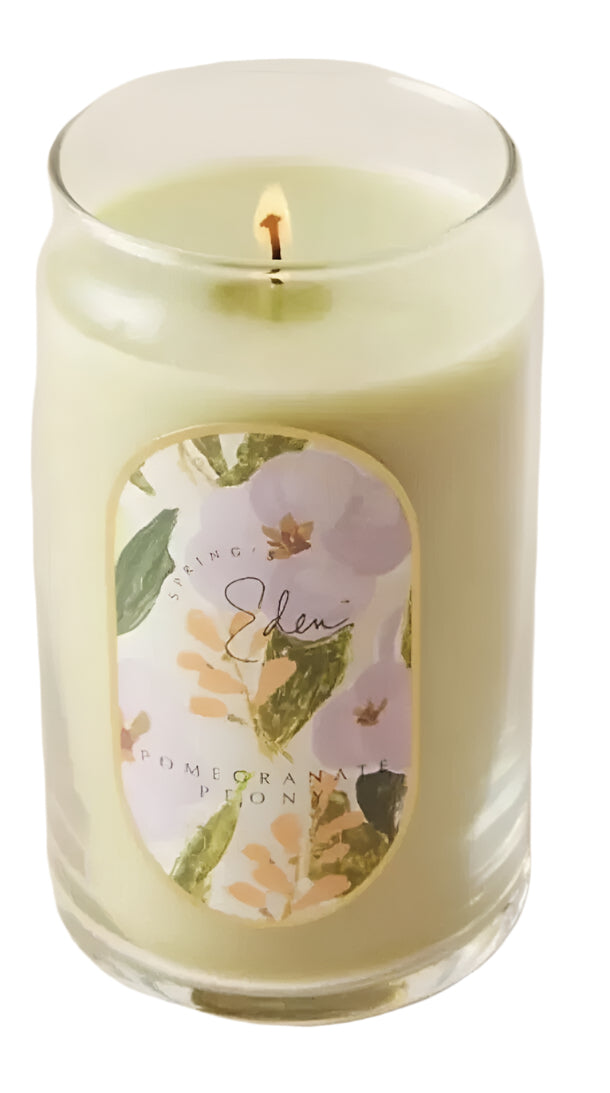 Illume Pomegranate Peony Soy Candle in floral glass jar, 12.6 oz, gift-wrapped in printed tissue.