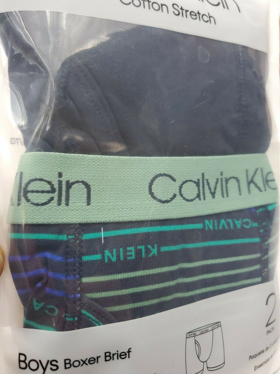 Calvin Klein boy’s boxer briefs, 2-pack cotton stretch underwear in size S (6-7), black/navy and stripe, shown in original packaging.