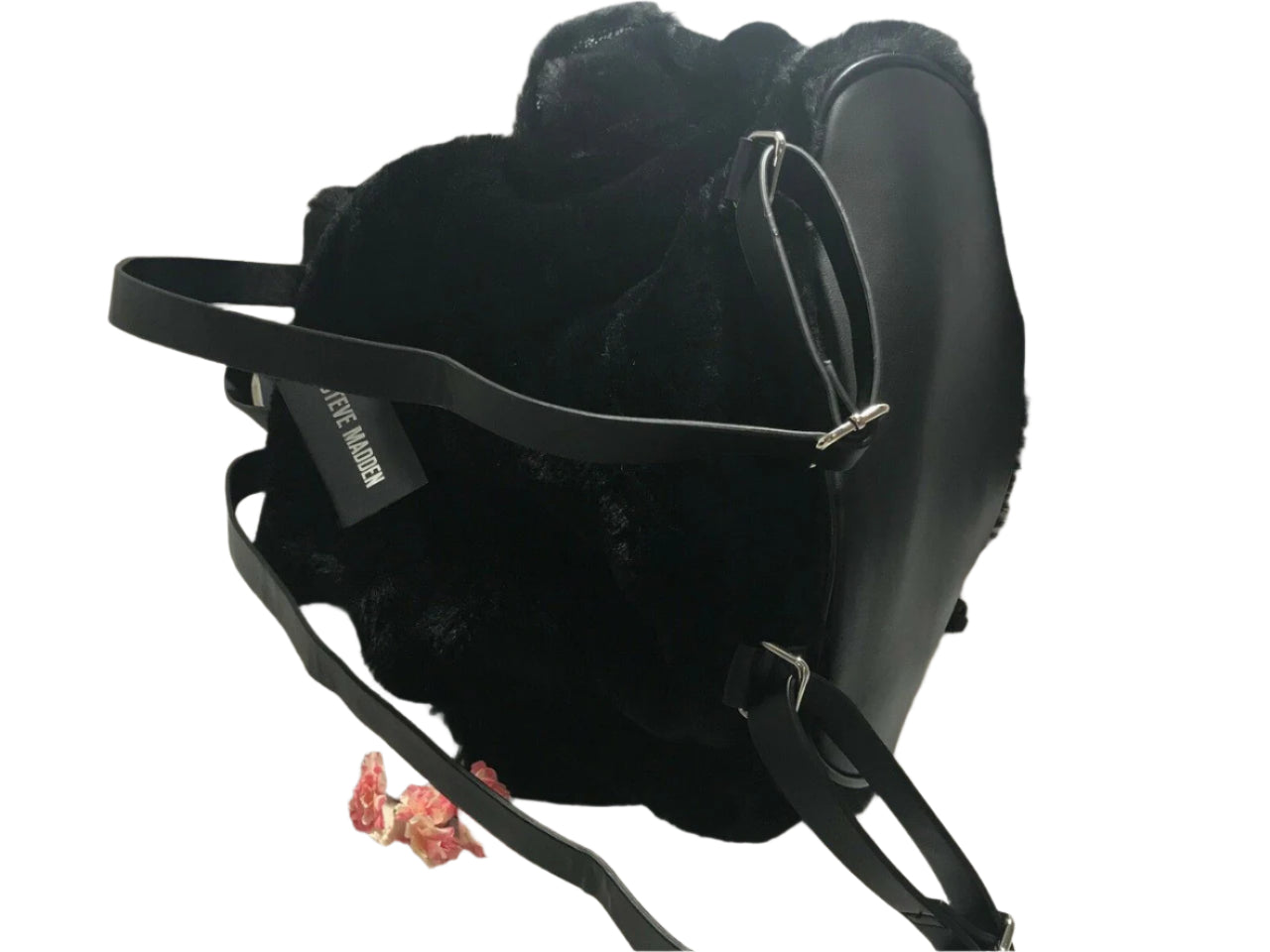 Steve Madden medium black faux fur backpack with decorative pin, side pockets, and drawstring flap