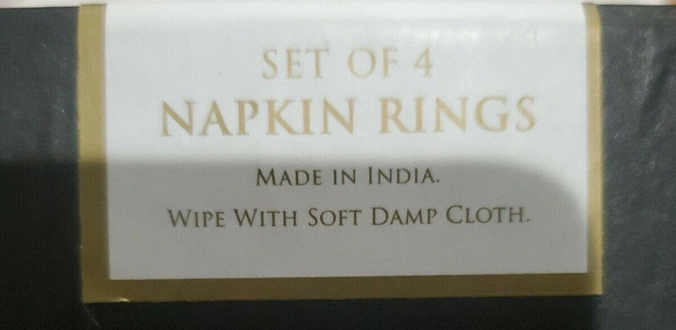 Set of four silver rhinestone turkey napkin rings displayed in black gift box