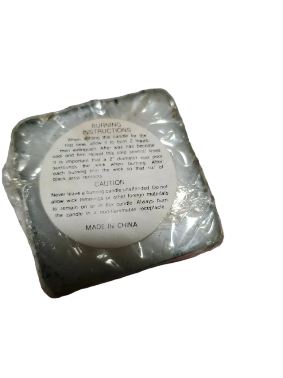 Vintage 7-inch Colonial Candle of Cape Cod with JOY lettering in gold and red wreath design, sealed in original wrap.