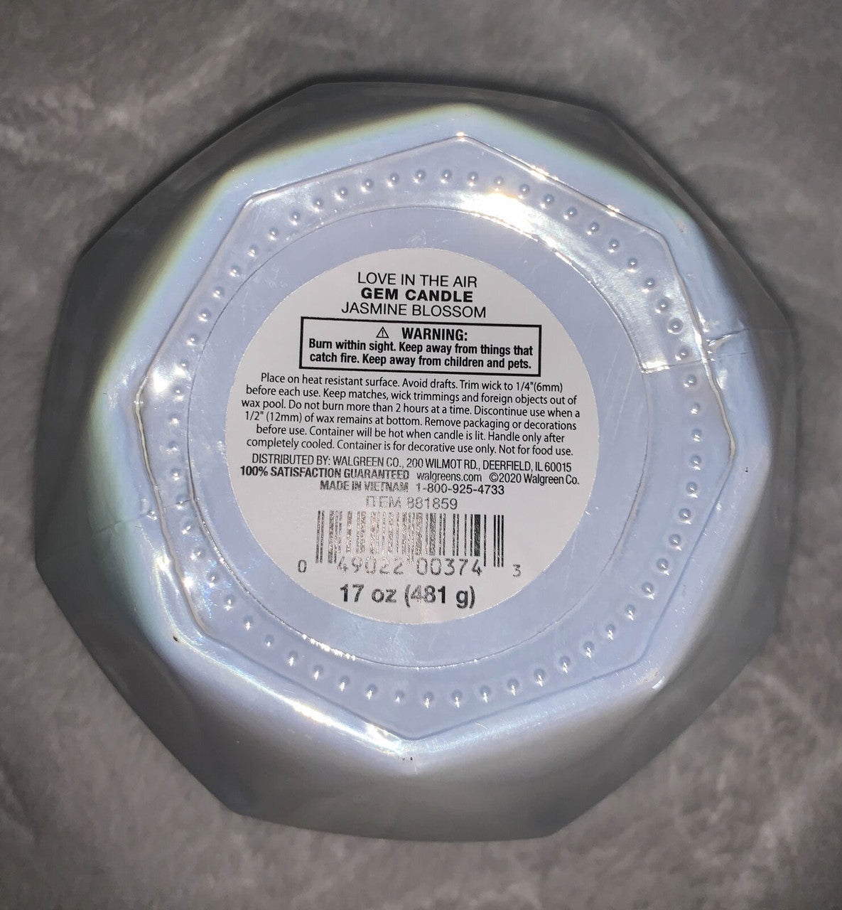 Jasmine Blossom 17 oz soy blend candle in a faceted pearl gem jar with black lid