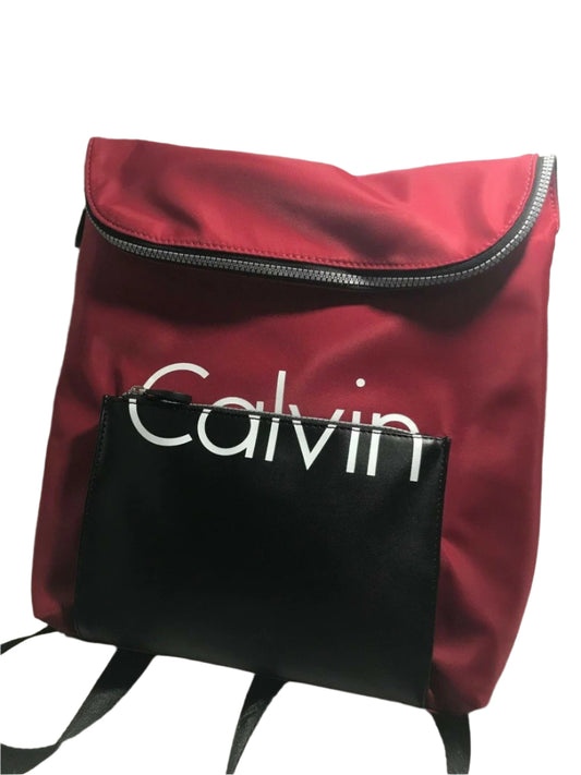 Red and black Calvin Klein backpack with large front logo, flap closure, and adjustable straps