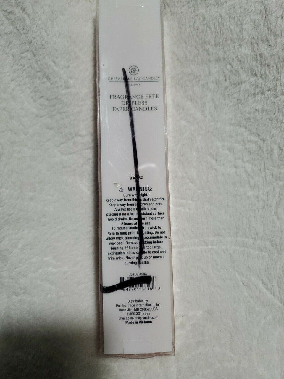 
Set of two fragrance-free 10-inch taper candles in terracotta, sealed in a Chesapeake Bay gift pack.