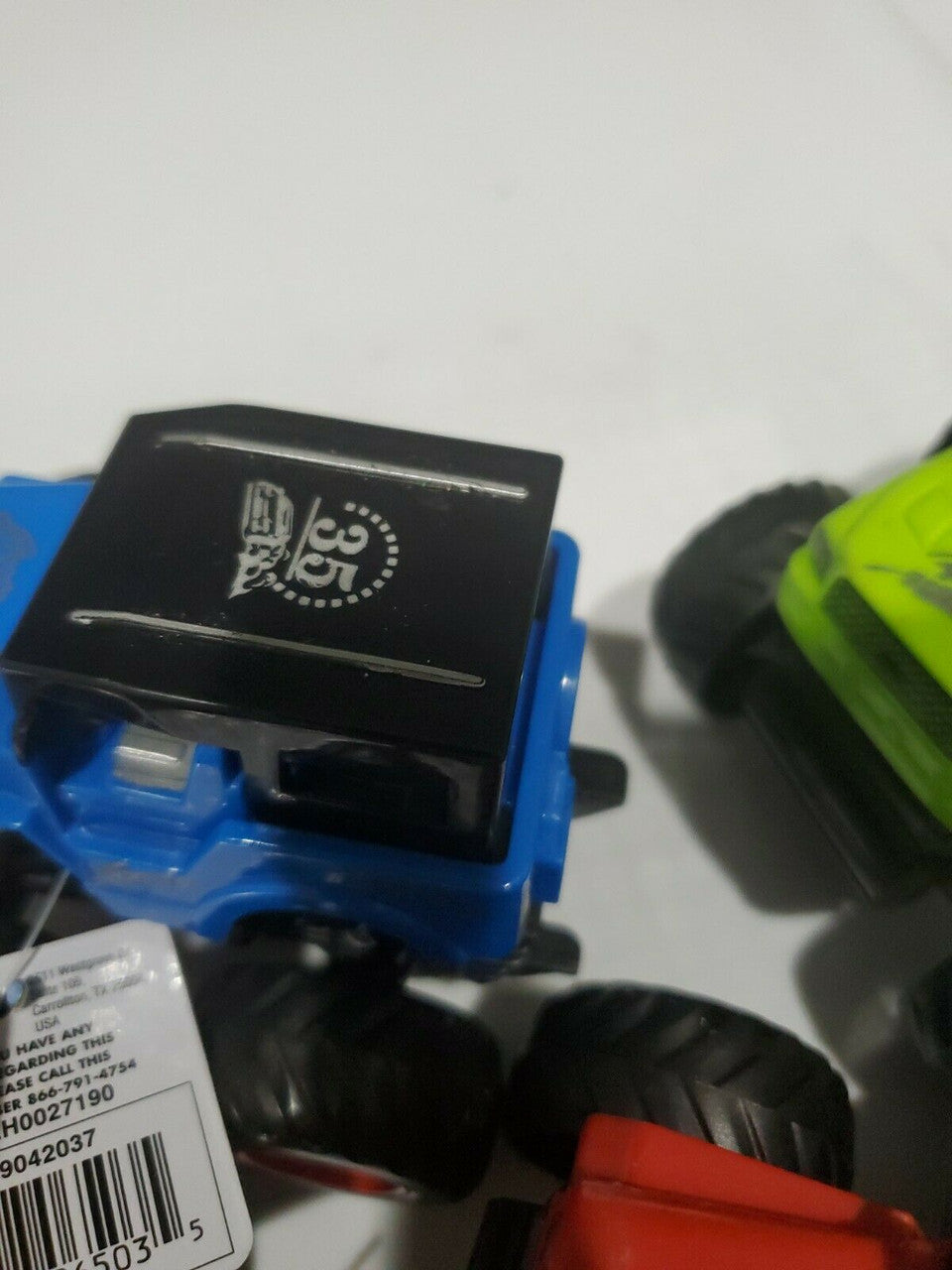 Friction powered 4WD jeep and monster truck toy set in packaging