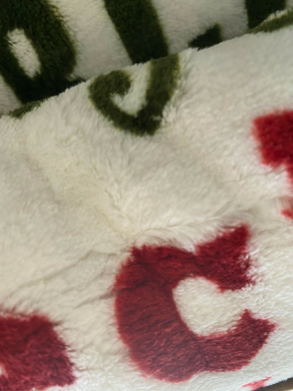 Holiday words soft fleece throw blanket, 50 x 70 inches, red green and white Christmas typography pattern by THRO Marlo Lorenz