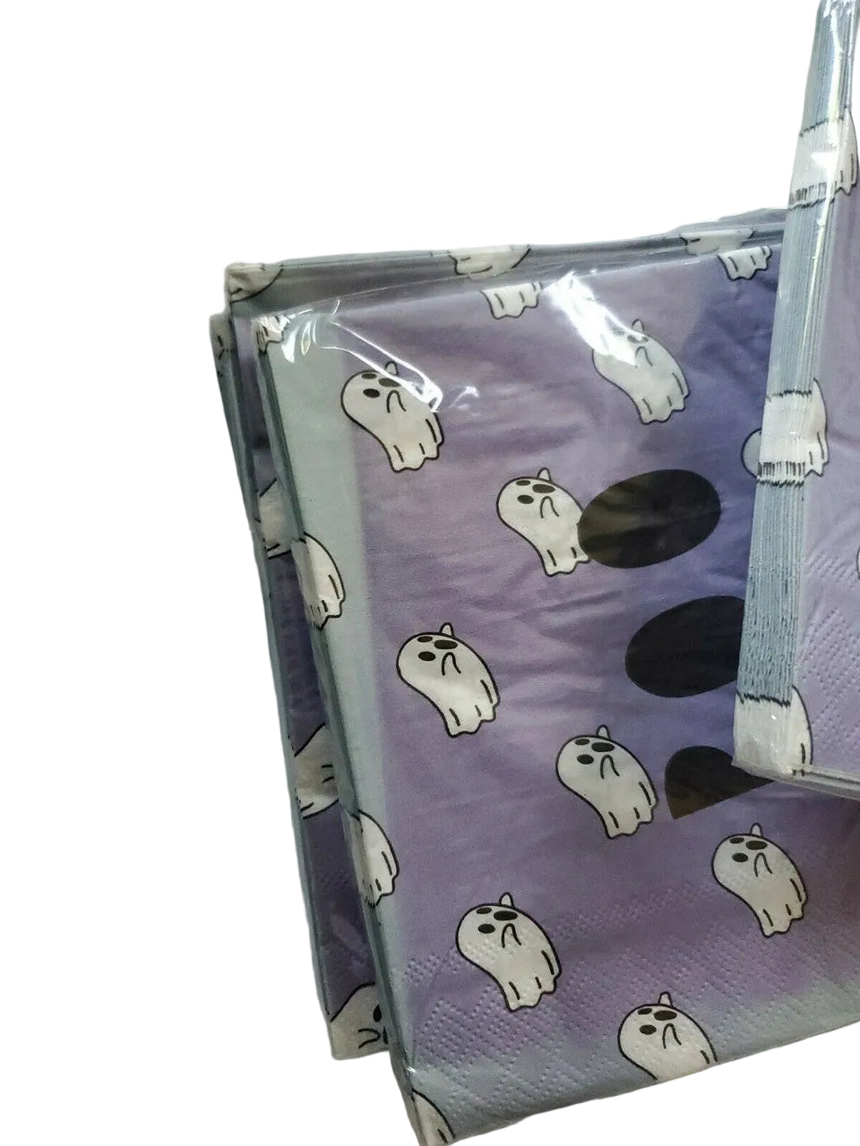 Stack of purple Halloween paper napkins with white ghost and BOO design in packaging