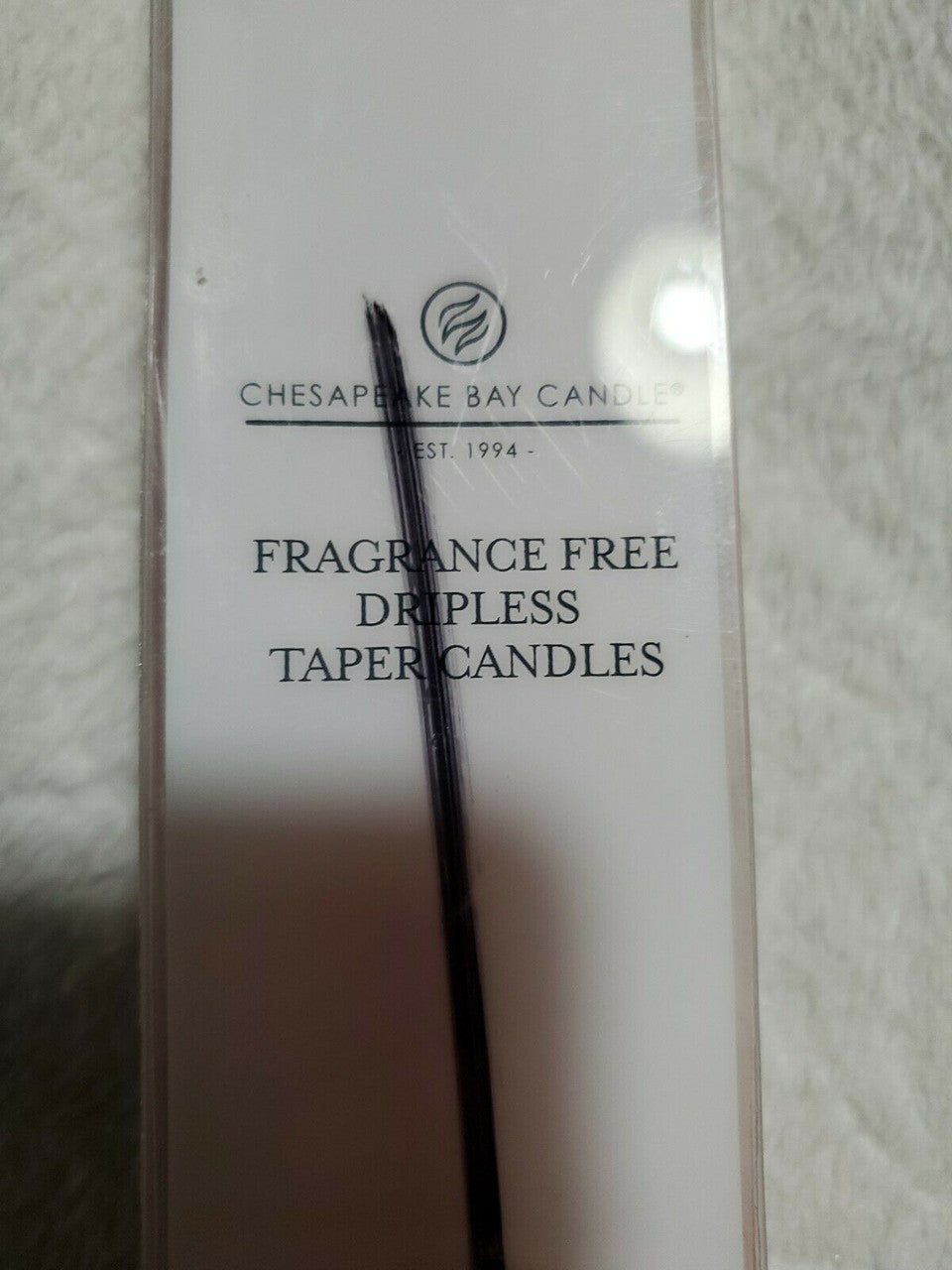 
Set of two fragrance-free 10-inch taper candles in terracotta, sealed in a Chesapeake Bay gift pack.