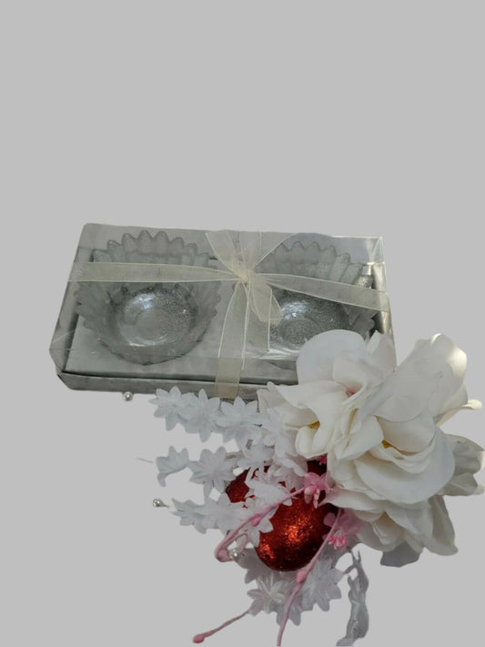 Set of 2 clear glass LUMINESCENCE candle holders with ridged design and ribbon wrap, 3.25 inches each.