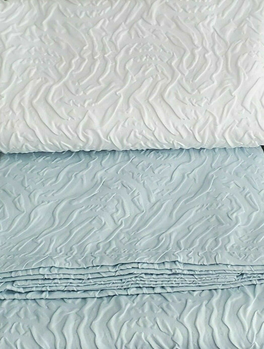 DKNY sculpted ombre shower curtain with white to blue gradient and cloud-like texture, size 72x72.