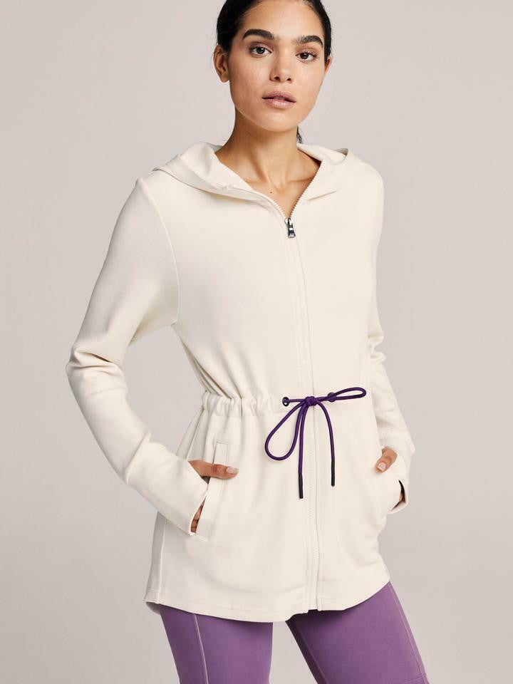 Women’s lightweight zip hoodie in ivory with adjustable drawstring waist and thumbholes