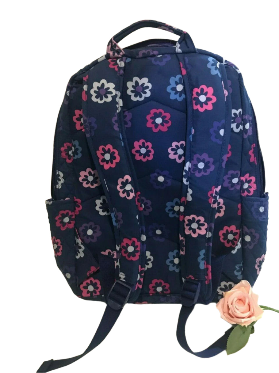 Vera Bradley Ellie Flowers quilted cotton laptop backpack with floral print, side pockets, and padded shoulder straps