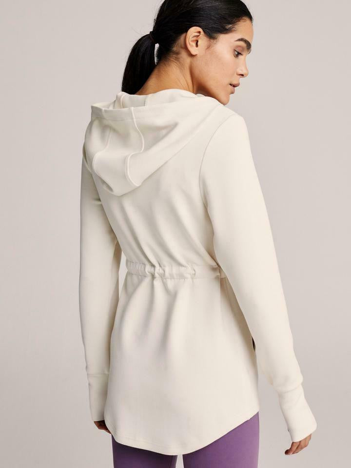Women’s lightweight zip hoodie in ivory with adjustable drawstring waist and thumbholes