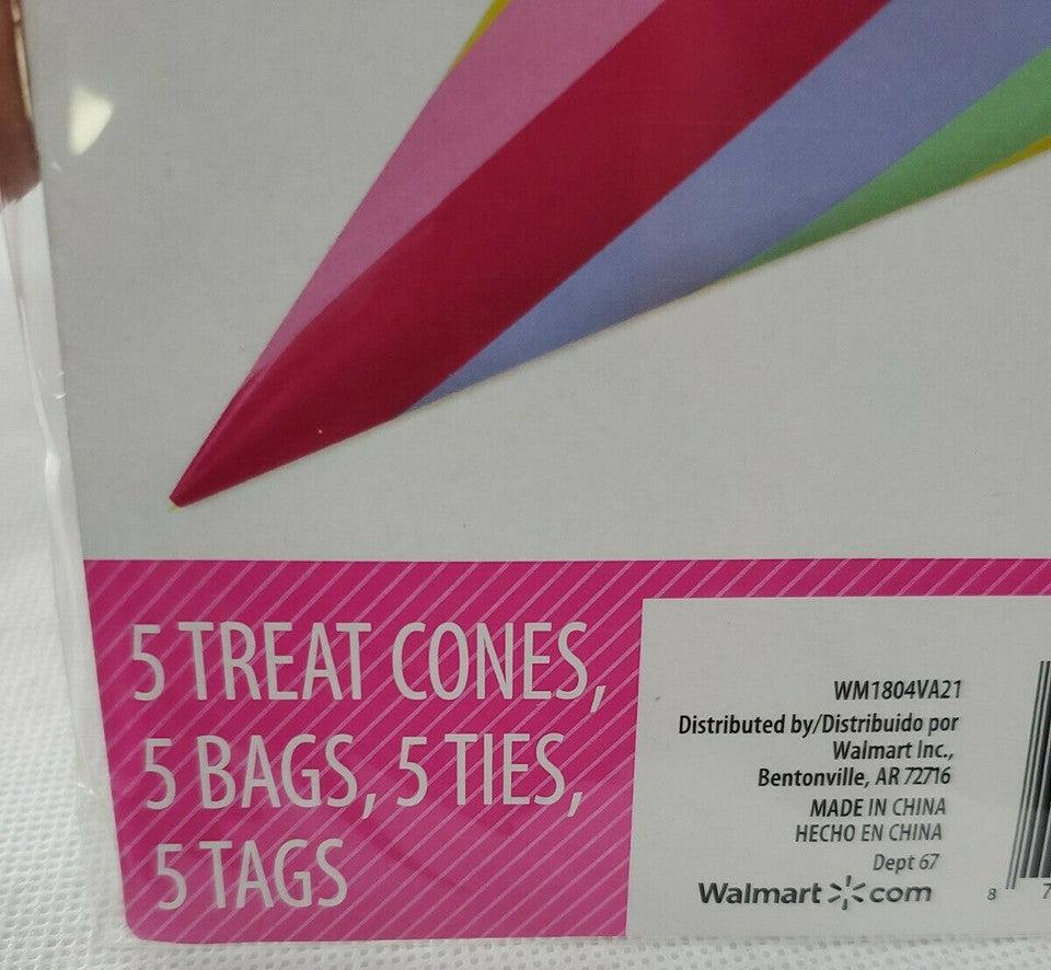 Close-up of product packaging with text and colorful handles.