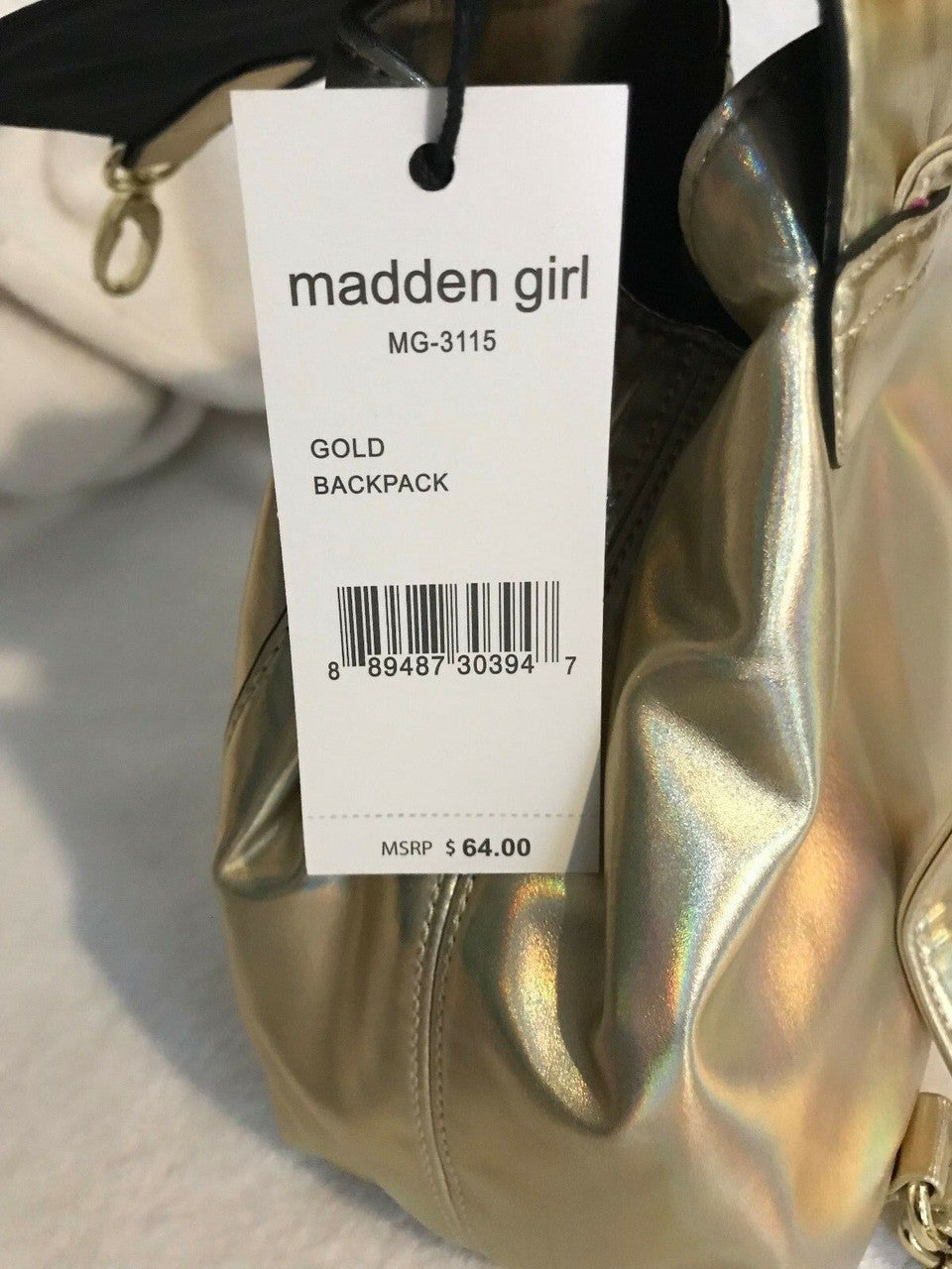 Madden Girl MG-3115 gold metallic faux leather backpack with front buckle and drawstring