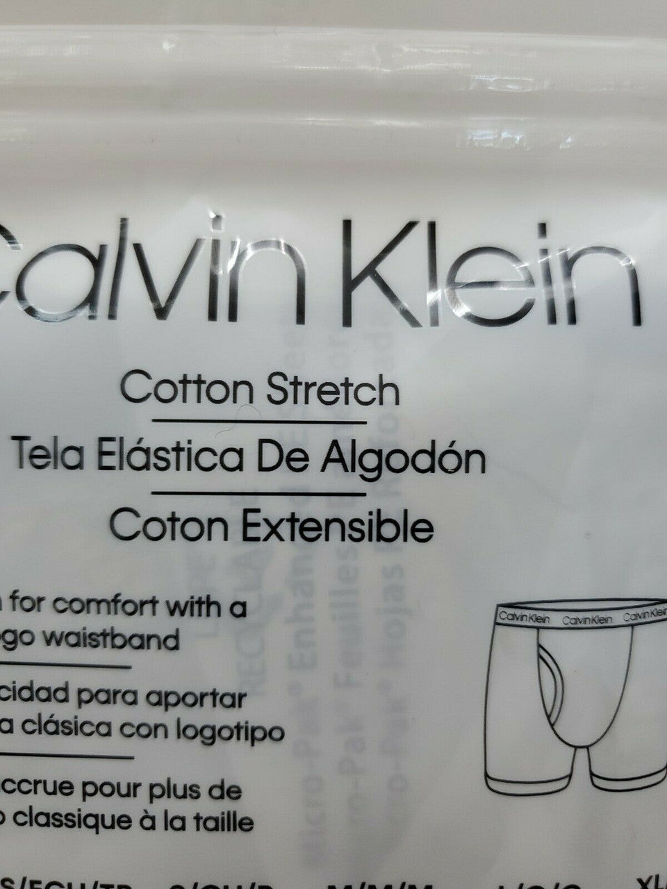 Close-up of Calvin Klein underwear label with text and logo.