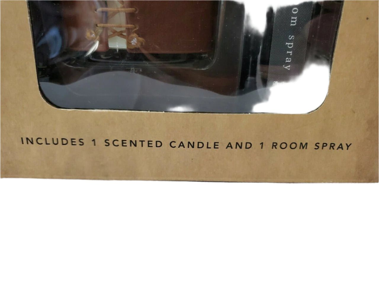 Gift set with Sand + Fog 8 oz teakwood candle and 100 ml room spray in amber containers, boxed for gifting.