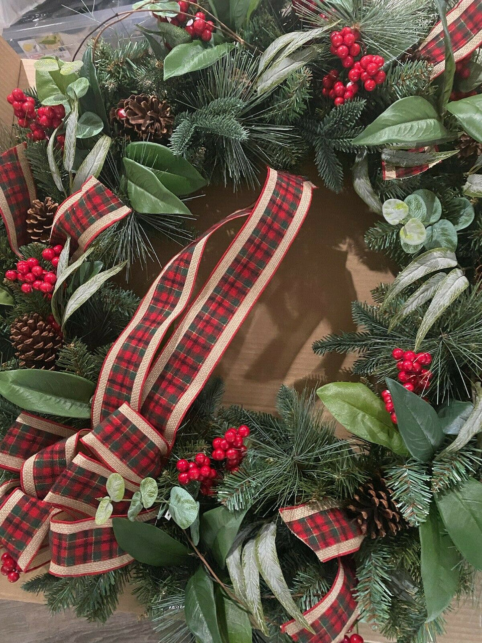 33-inch mixed floral holiday wreath with plaid ribbon and faux berries, new in box.