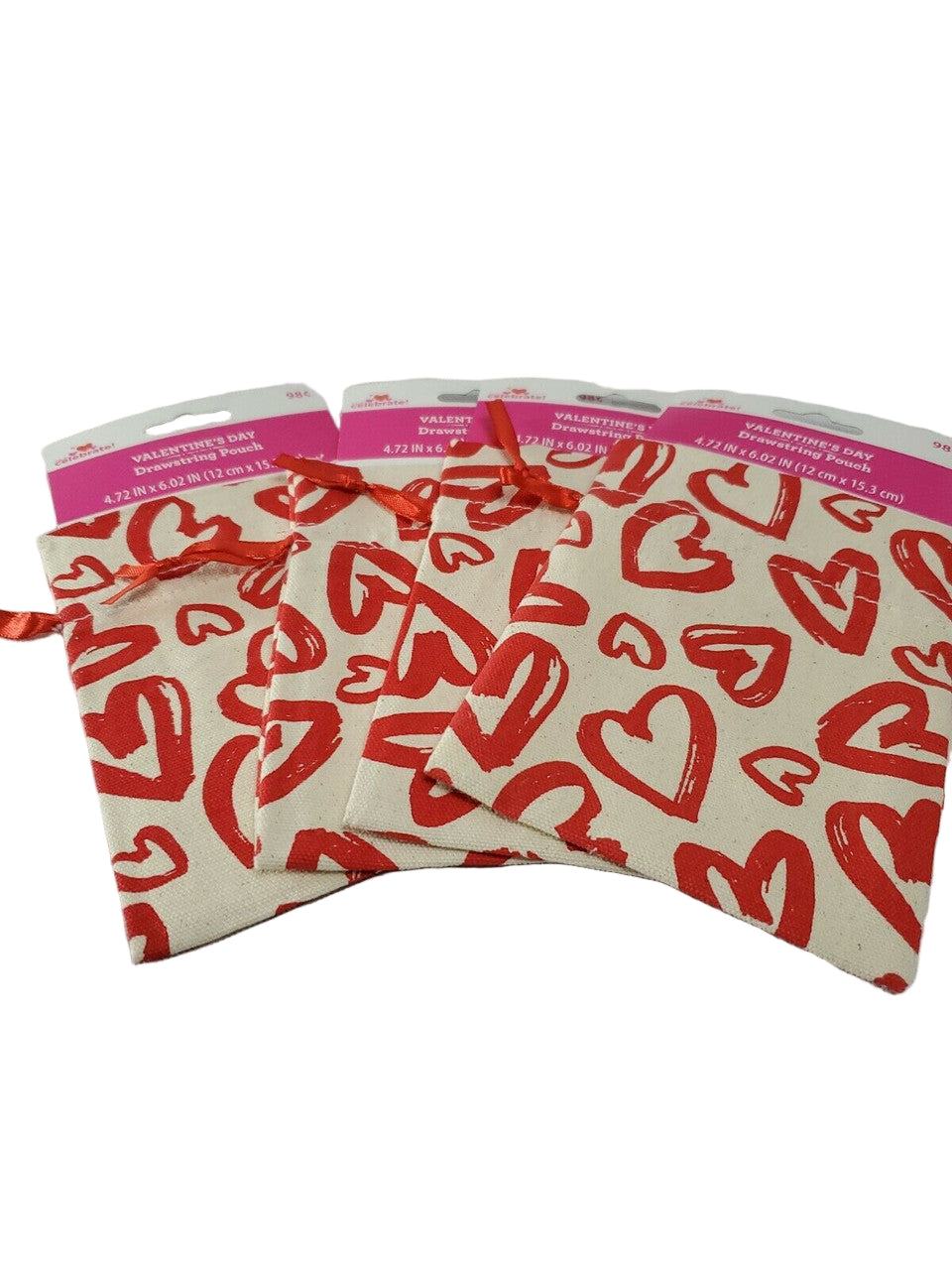 Three drawstring bags with red heart patterns on a white background