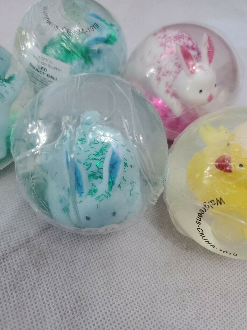 Happy Go Fluffy Light Up Bouncy Balls for Kids, Set of 5 LED Bouncing Easter