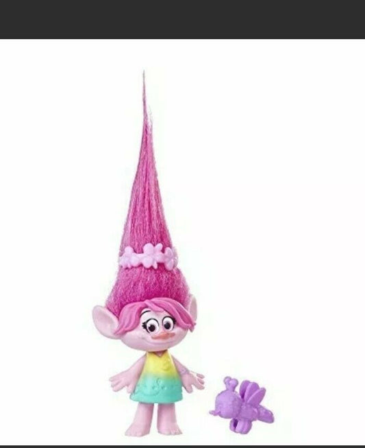 A collectible 4-inch figure of Poppy from DreamWorks Trolls, featuring pink hair with a flower crown, wearing a green and yellow outfit, accompanied by a small purple critter.