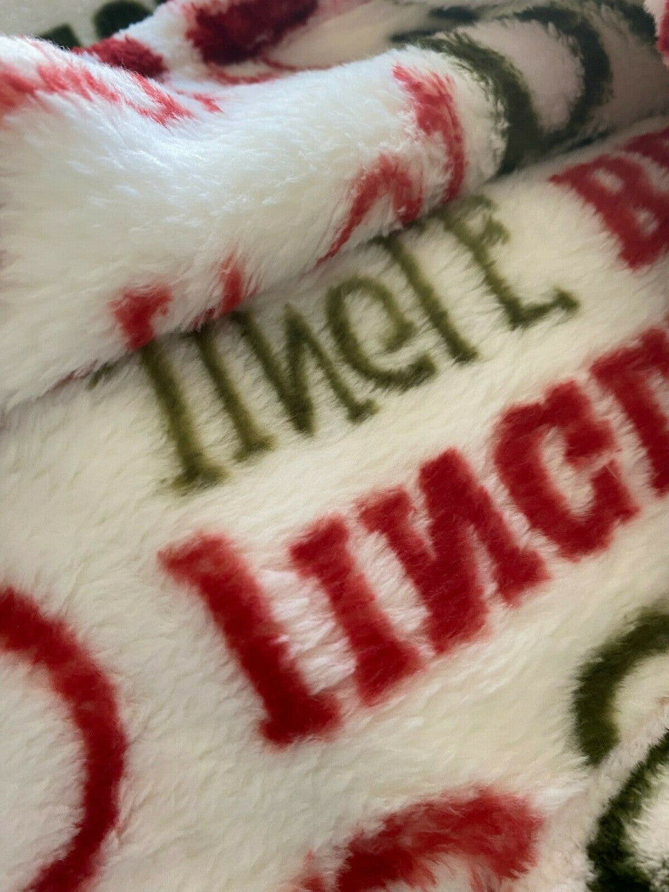 Holiday words soft fleece throw blanket, 50 x 70 inches, red green and white Christmas typography pattern by THRO Marlo Lorenz