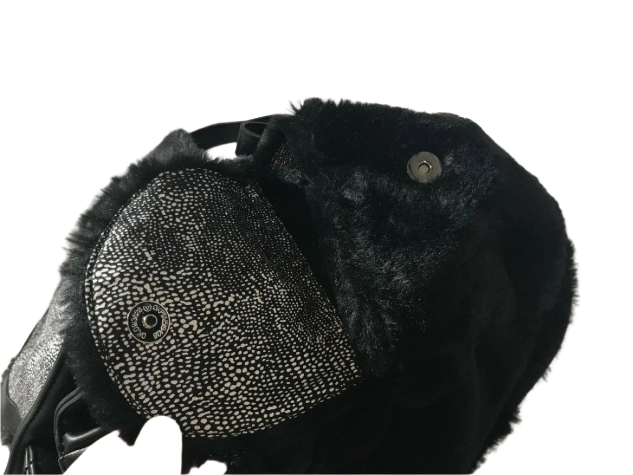Steve Madden medium black faux fur backpack with decorative pin, side pockets, and drawstring flap
