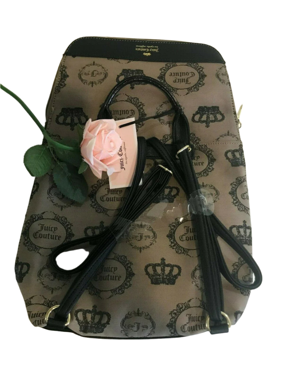 Beige and black canvas backpack with gold Juicy Couture logo and medallion design