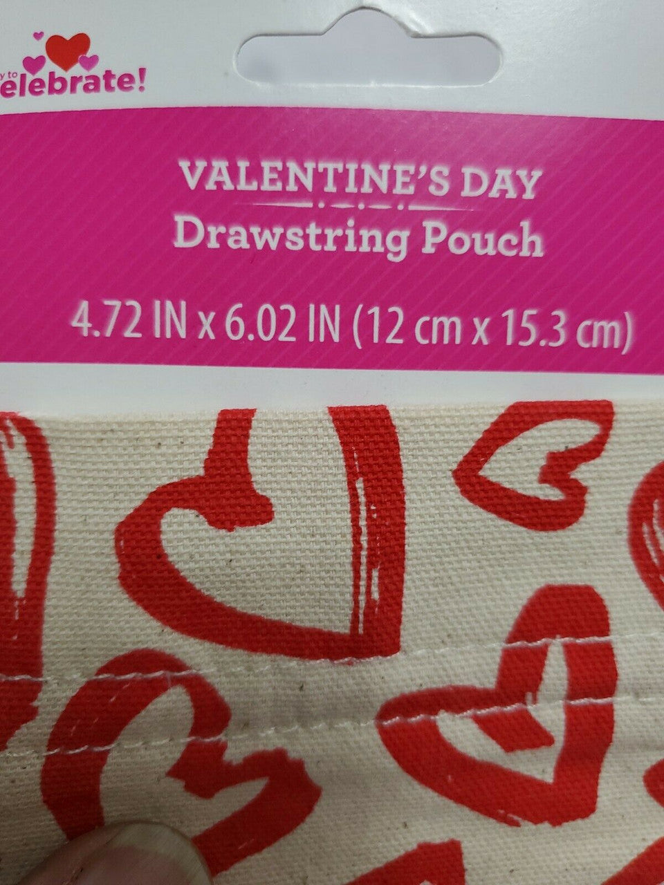 Valentine's Day drawstring pouch with heart pattern on packaging.