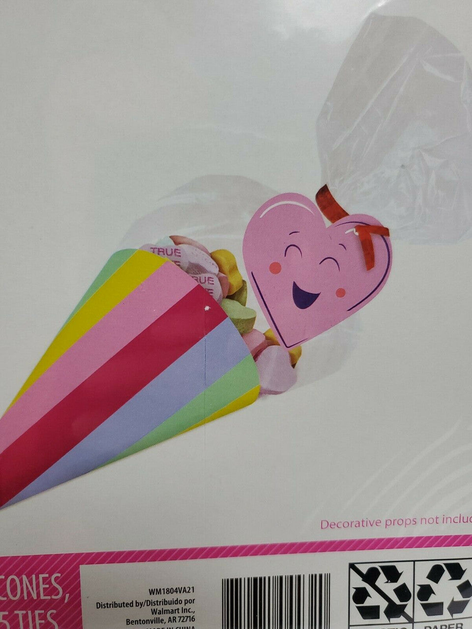 Heart-shaped balloon with a bow on a white background