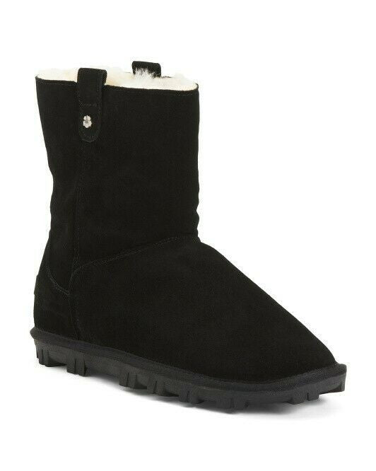 A black suede TOMMY BAHAMA shearling lined boot with a side snap closure.
