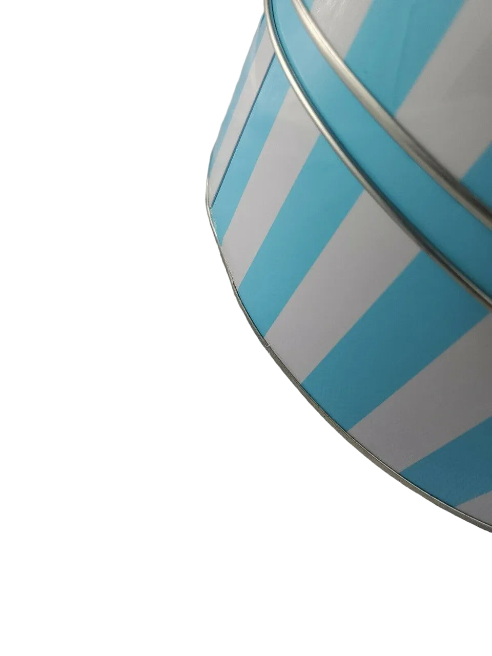 Close-up of blue and white striped fabric against a textured gray background.